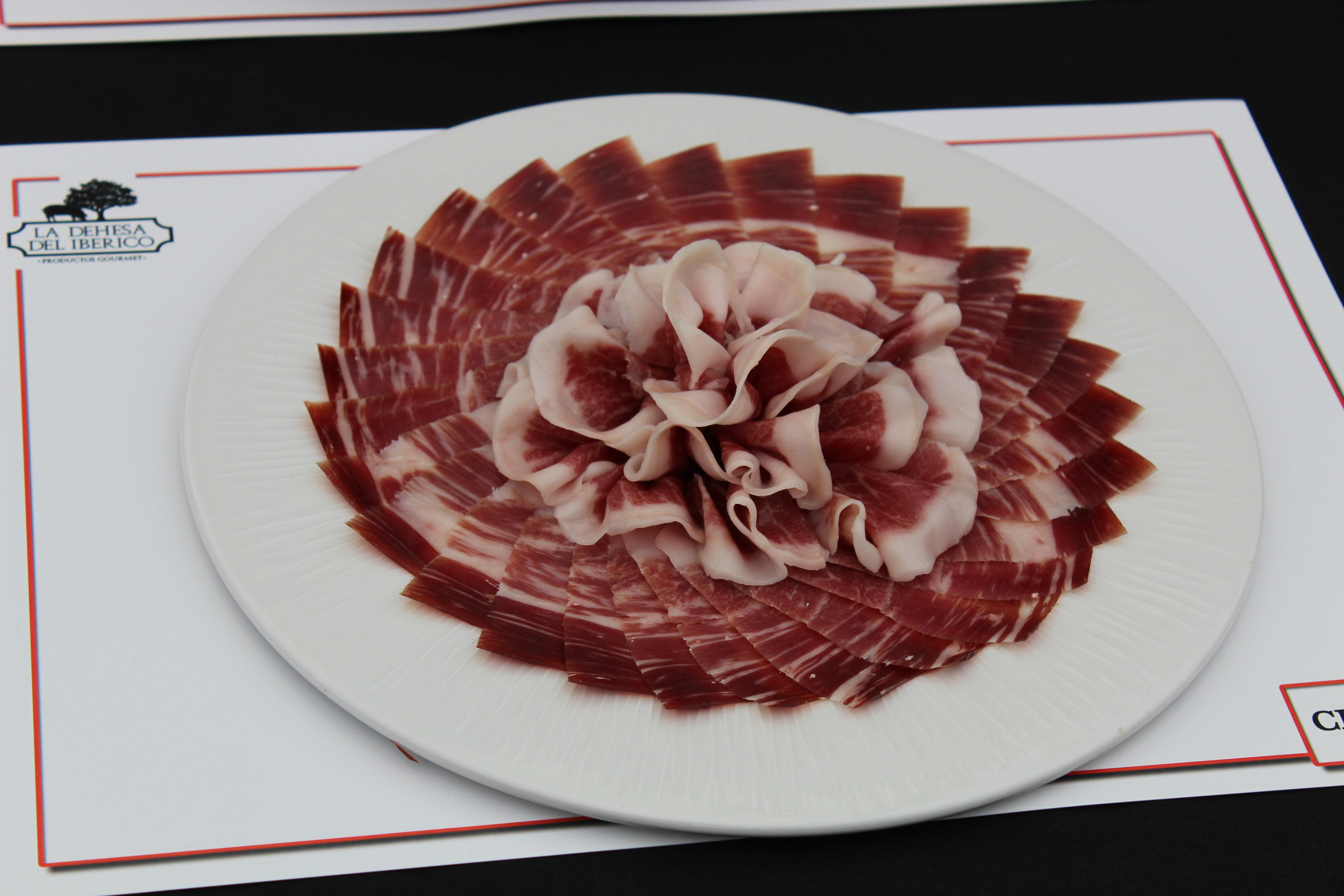A plate of sliced Spanish ham