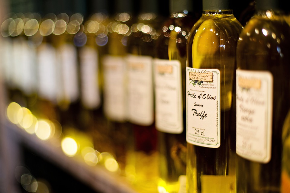 Olive oil bottles on the shelf.
