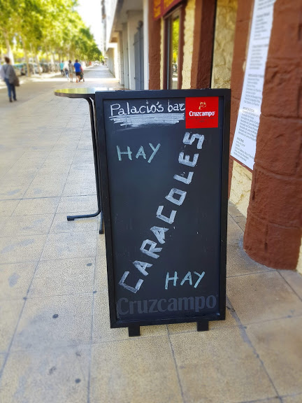 A sign advertising snails at a tapas bar in Seville.