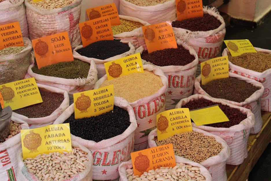 legumes at the Feria food market in Seville.